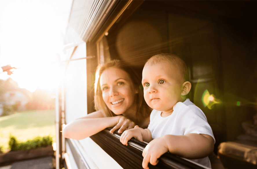 mom and baby in camper