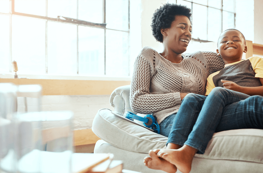 woman and child on couch