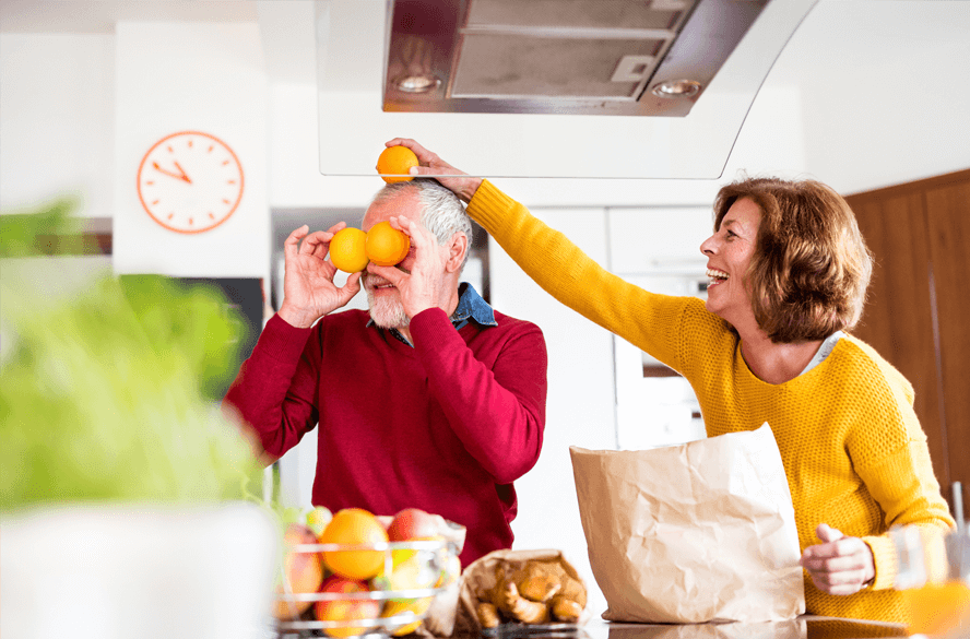 people playing with oranges